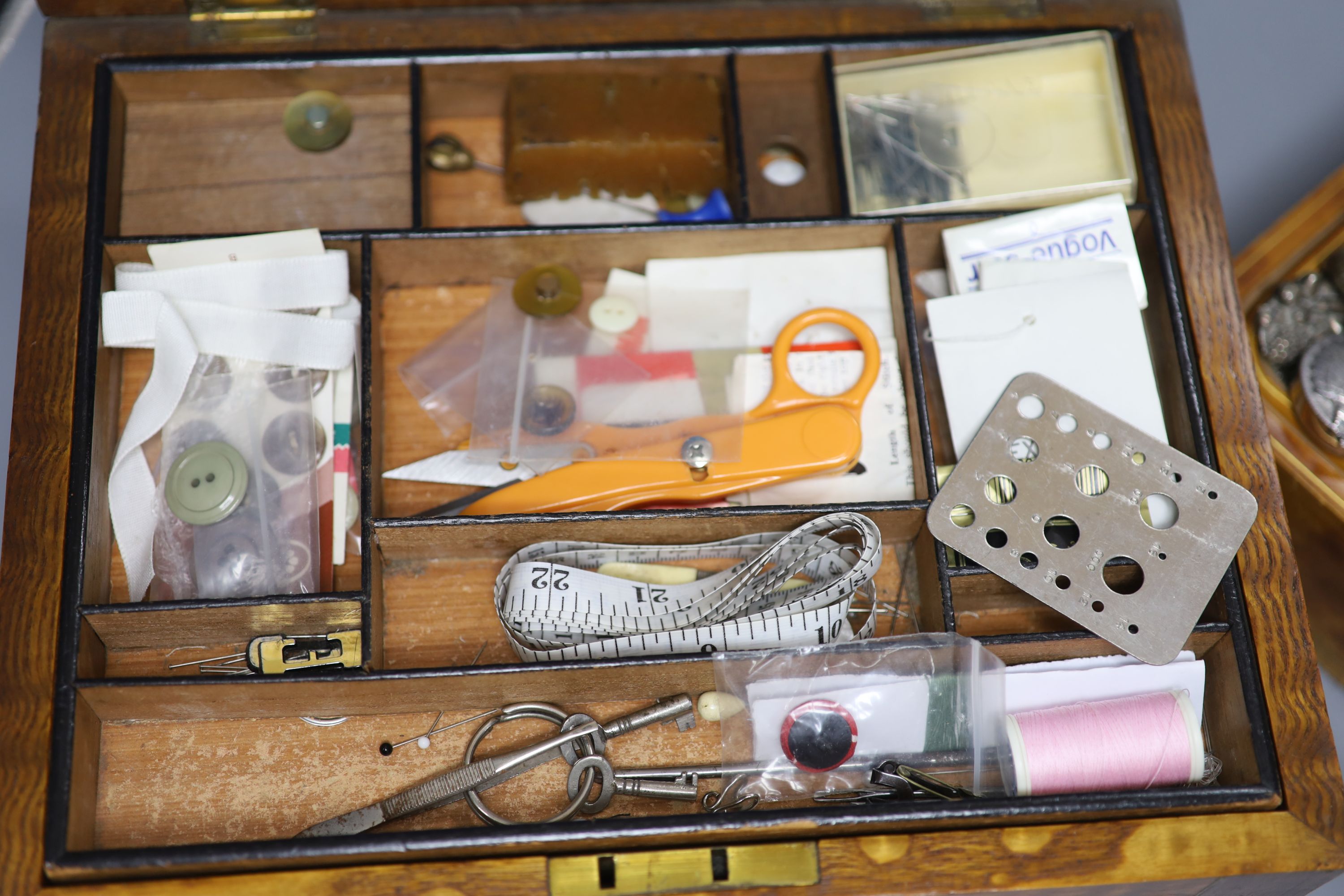 Various modern pill boxes, a pollard oak sewing box with contents, a leather jewellery case, a silver-mounted hand mirror, etc.